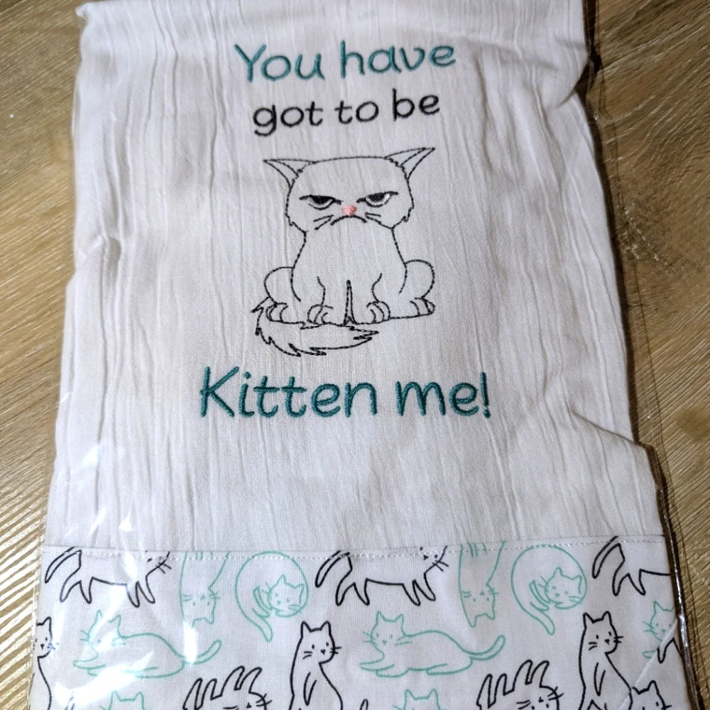 Cat-Themed White and Black Towel